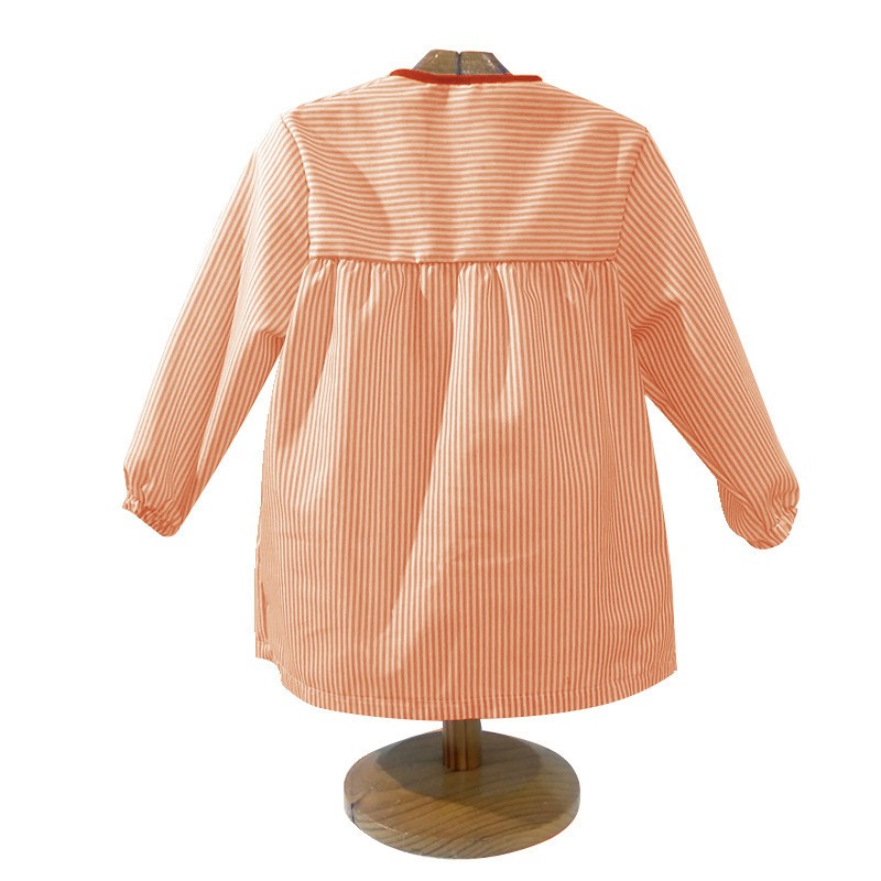 Comprar Bata infantil naranja con botones y dibujo de un niño astronauta