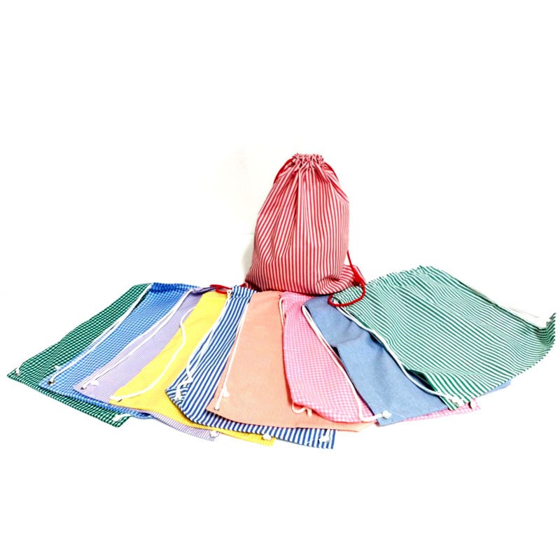 Comprar Mochila para muda estampada de cuadros azul marino